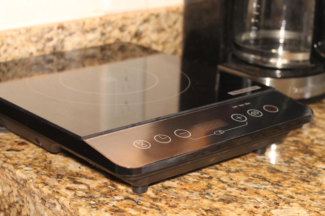 Papagayo Hotel Boutique Плая дел Кармен Екстериор снимка A portable hot plate